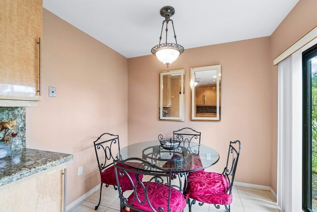 dining space with light tile patterned floors