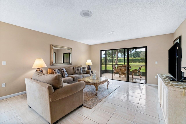 tiled living room with a textured ceiling