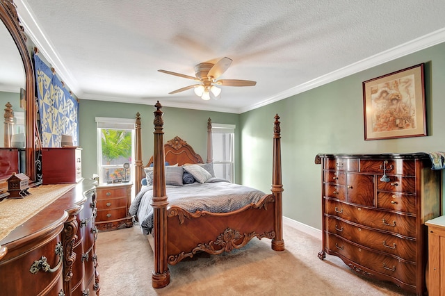 bedroom with light carpet, ceiling fan, crown molding, and a textured ceiling