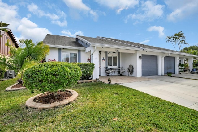 ranch-style house with a front yard and a garage