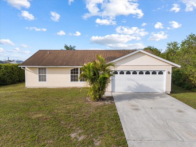 single story home with a garage and a front yard