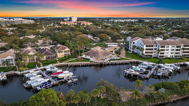 aerial view at dusk with a water view