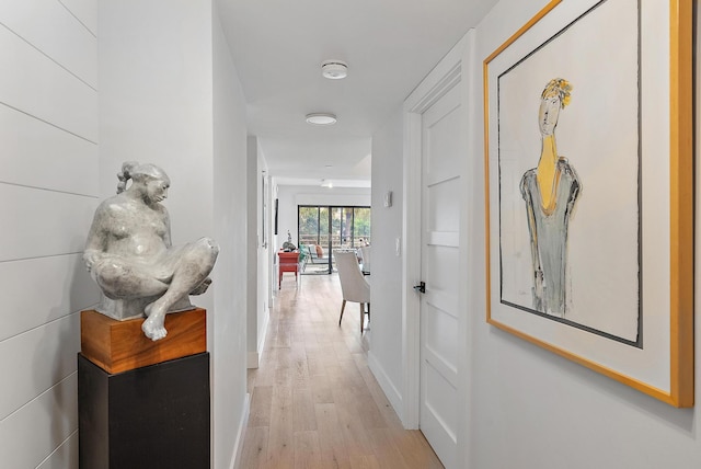 corridor featuring light hardwood / wood-style flooring