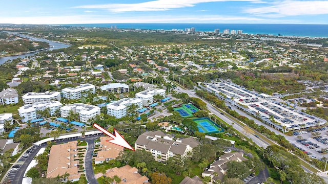 birds eye view of property featuring a water view