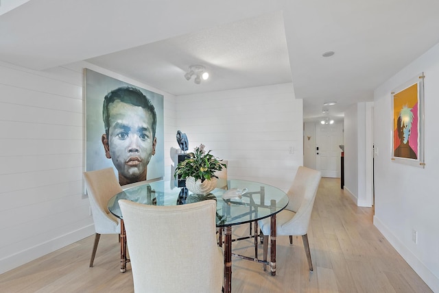 dining room featuring light hardwood / wood-style floors