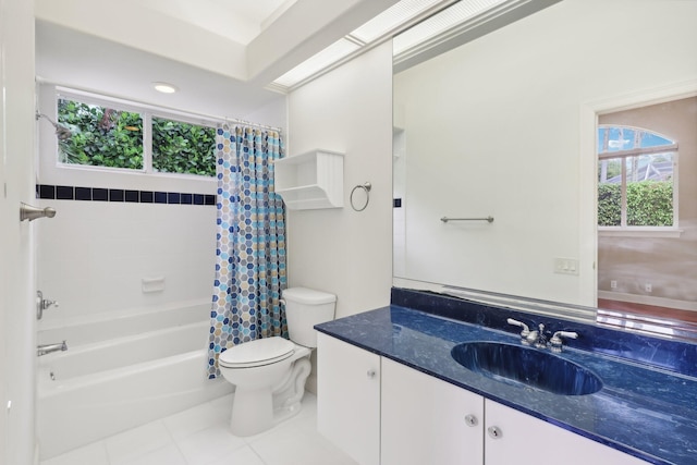 full bathroom featuring toilet, shower / bath combination with curtain, tile patterned floors, and vanity