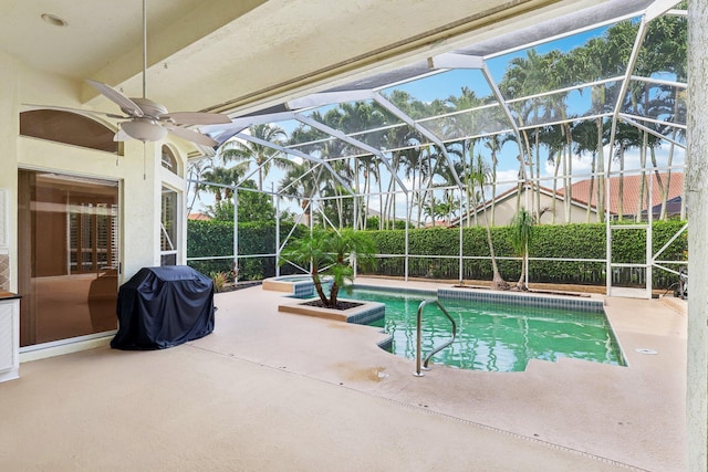 view of pool featuring a lanai, grilling area, and a patio area