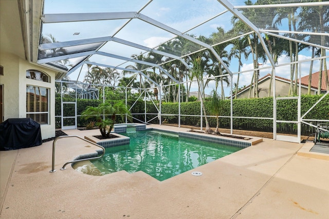 view of swimming pool with a grill, glass enclosure, and a patio