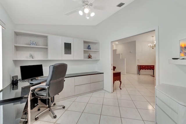 tiled office space featuring lofted ceiling and ceiling fan with notable chandelier