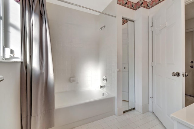 bathroom featuring tile patterned floors and shower / bathtub combination with curtain