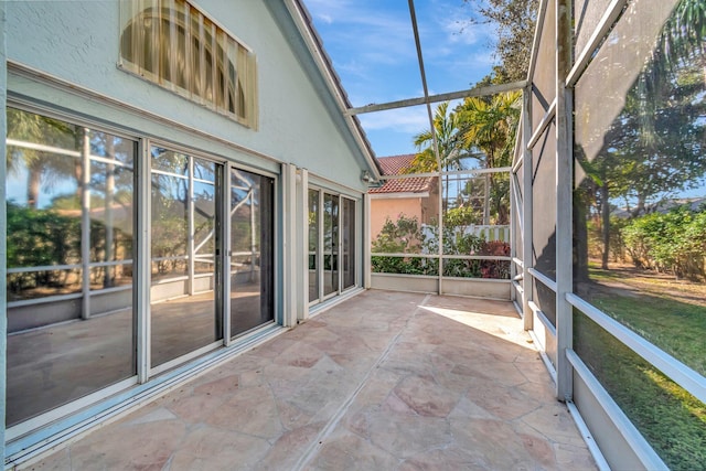 unfurnished sunroom with a wealth of natural light