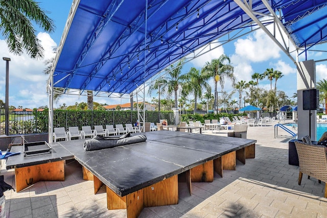 view of patio featuring a bar