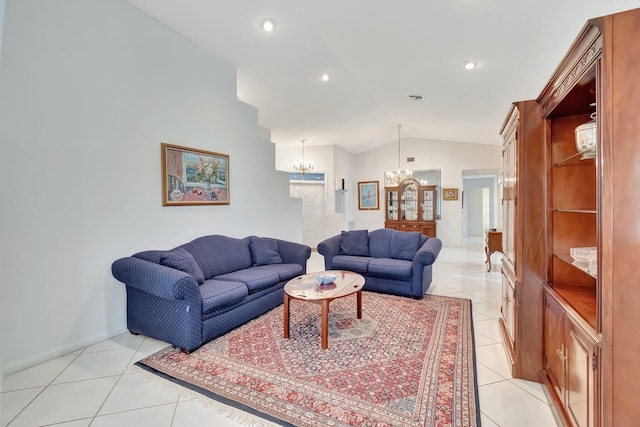 living room featuring an inviting chandelier, vaulted ceiling, and light tile patterned floors