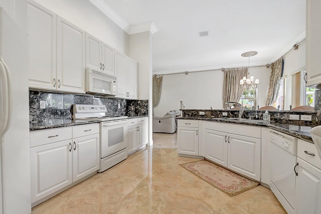 kitchen featuring white appliances, white cabinets, and dark stone countertops