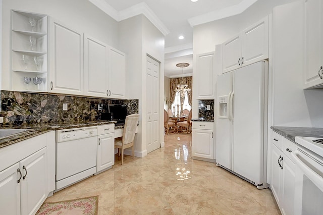 kitchen with white appliances, pendant lighting, backsplash, white cabinets, and ornamental molding