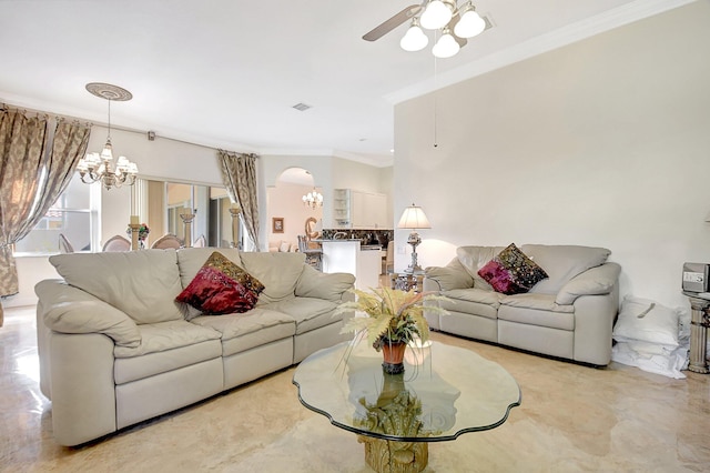 living room with ornamental molding and ceiling fan with notable chandelier