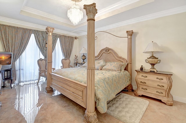 bedroom featuring a raised ceiling and ornamental molding