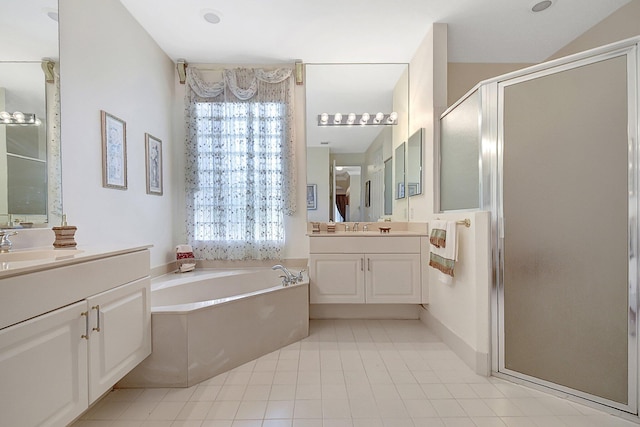 bathroom featuring vanity, tile patterned flooring, and independent shower and bath