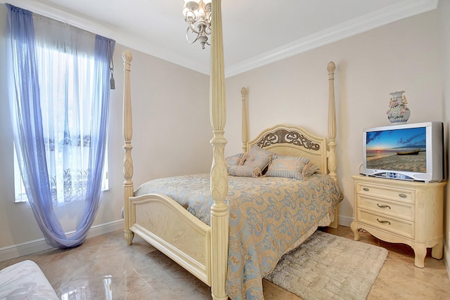 bedroom featuring ornamental molding and a notable chandelier