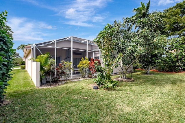 view of yard with a lanai