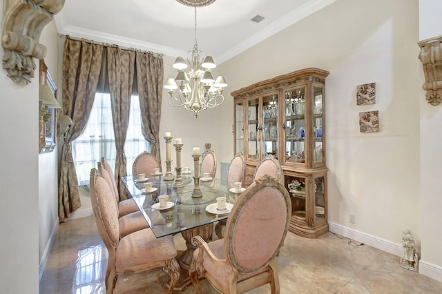 dining room with an inviting chandelier and crown molding