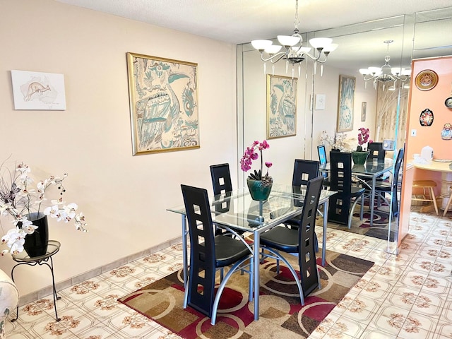 dining area featuring a chandelier