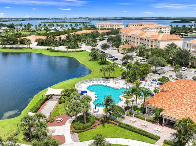 birds eye view of property featuring a water view