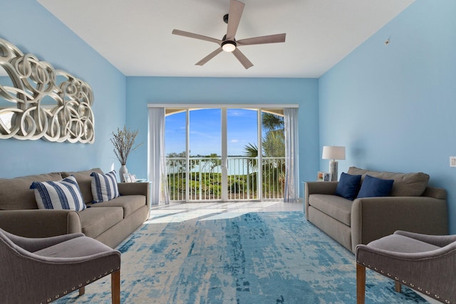 living room featuring ceiling fan