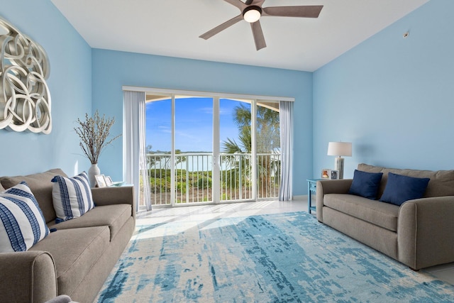 tiled living area featuring a ceiling fan