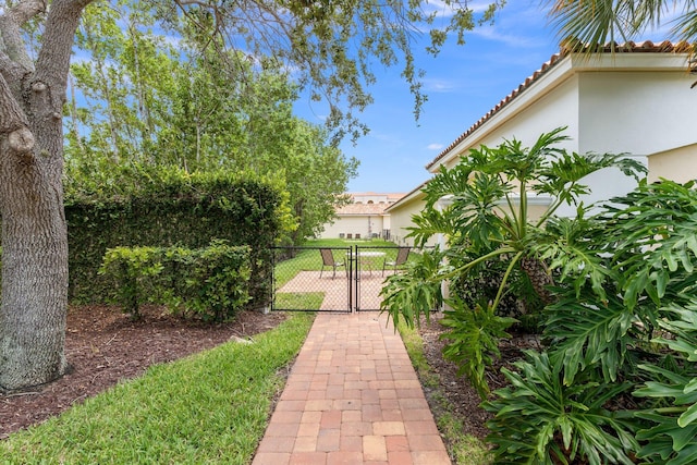 view of yard featuring a gate and fence