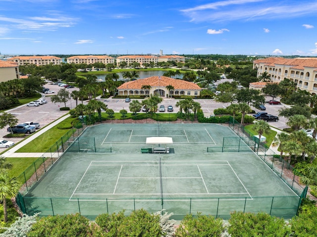 view of sport court with fence