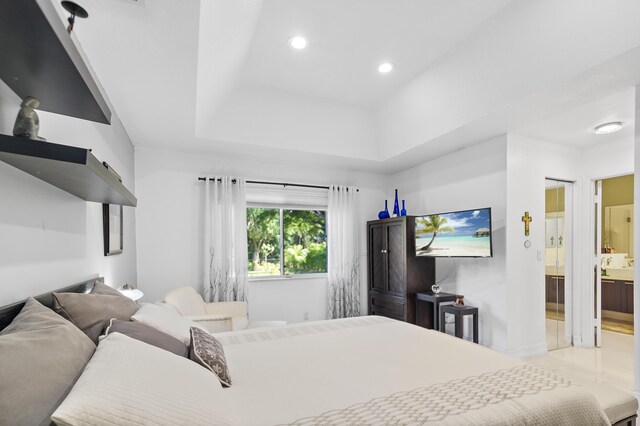 bedroom featuring a tray ceiling