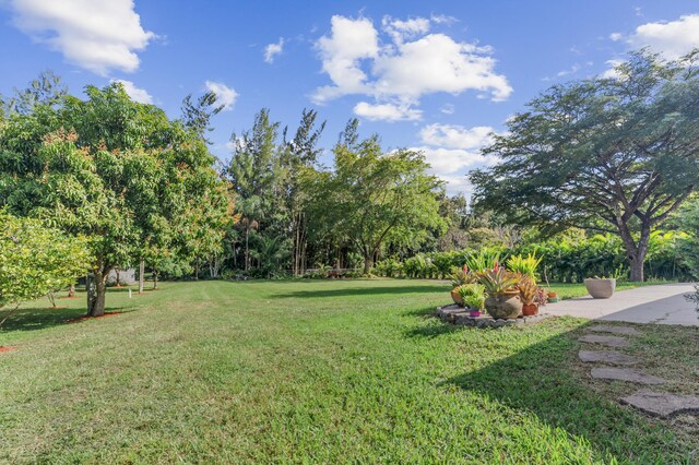 view of front of home featuring a garage and a front lawn