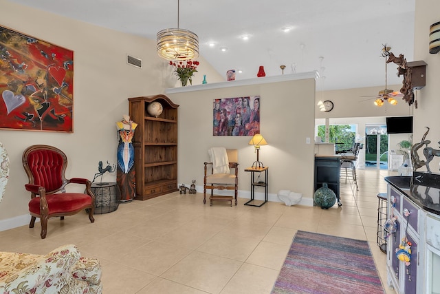 living room with ceiling fan, light tile patterned floors, and high vaulted ceiling