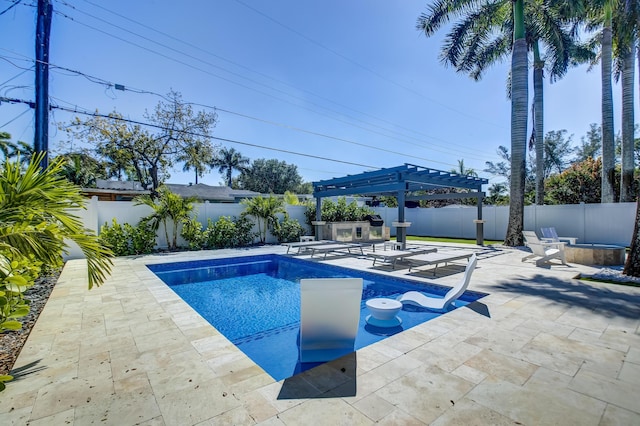 view of swimming pool with a pergola and a patio