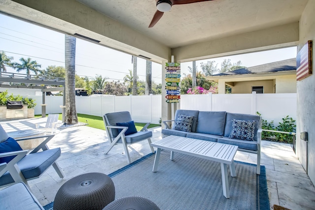 view of patio with ceiling fan and an outdoor hangout area