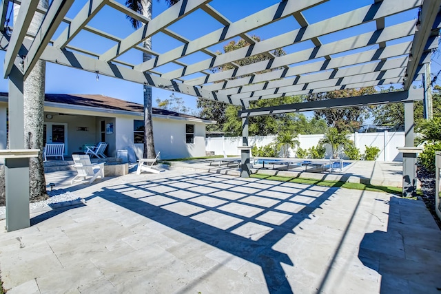 view of patio / terrace with a fenced in pool and a pergola