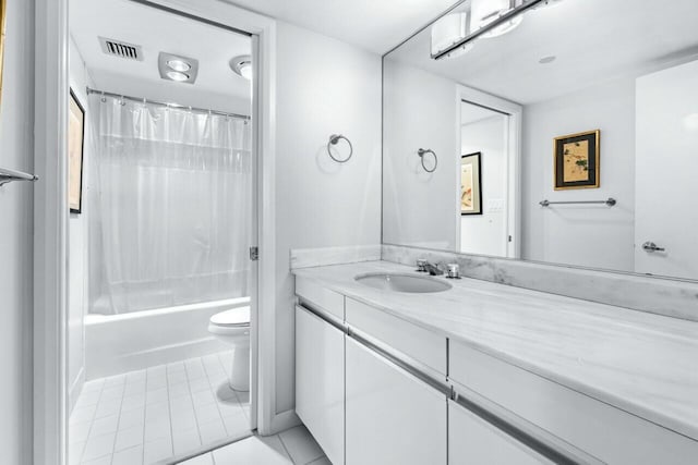 100 Lakeshore Dr Unit 252, North Palm Beach, FL 33408 - full bathroom featuring toilet, tile patterned flooring, shower / tub combo, and vanity