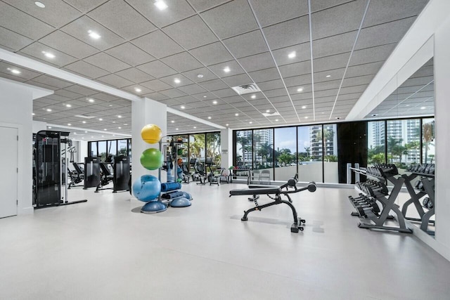 100 Lakeshore Dr Unit 252, North Palm Beach, FL 33408 - workout area with a paneled ceiling and expansive windows