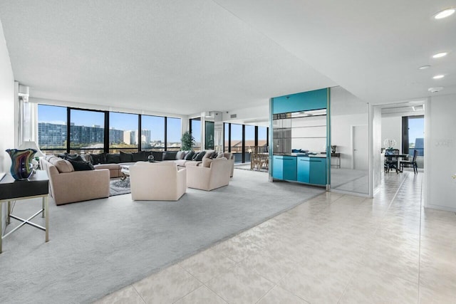 100 Lakeshore Dr Unit 252, North Palm Beach, FL 33408 - living room with a textured ceiling and light colored carpet