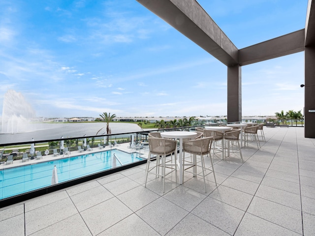 view of pool featuring a patio area