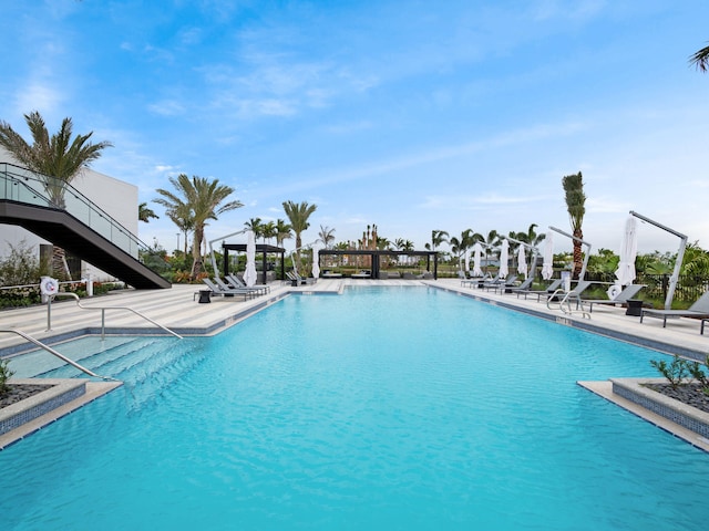 view of pool featuring a gazebo and a patio area