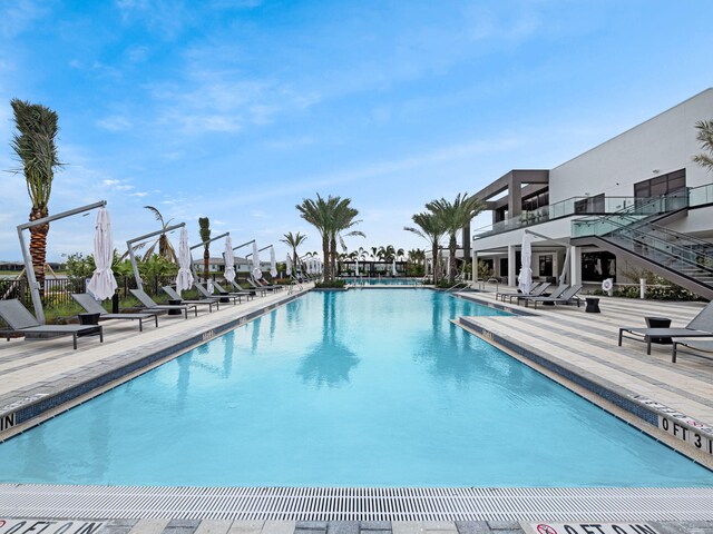 view of swimming pool with a patio area