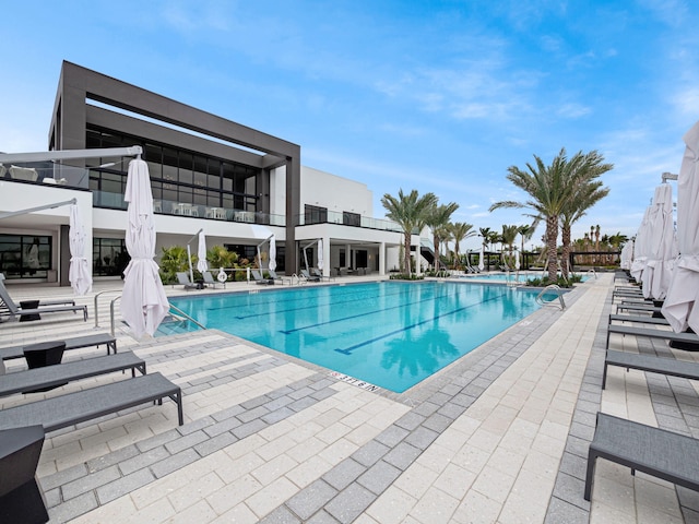 view of swimming pool featuring a patio