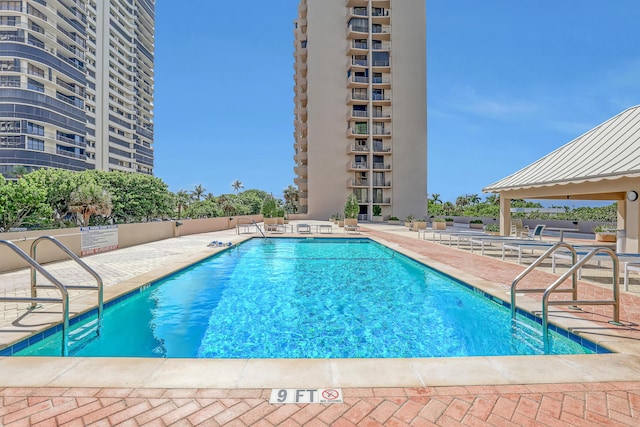 view of pool featuring a gazebo and a patio