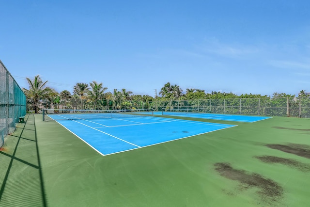 view of tennis court with basketball court