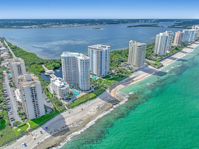 aerial view with a view of the beach and a water view