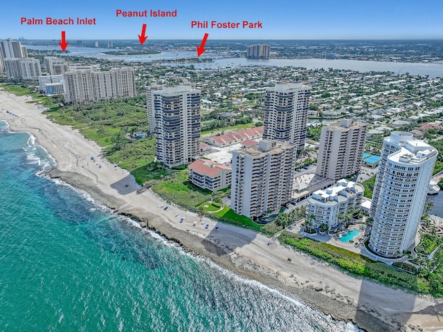 bird's eye view featuring a beach view and a water view