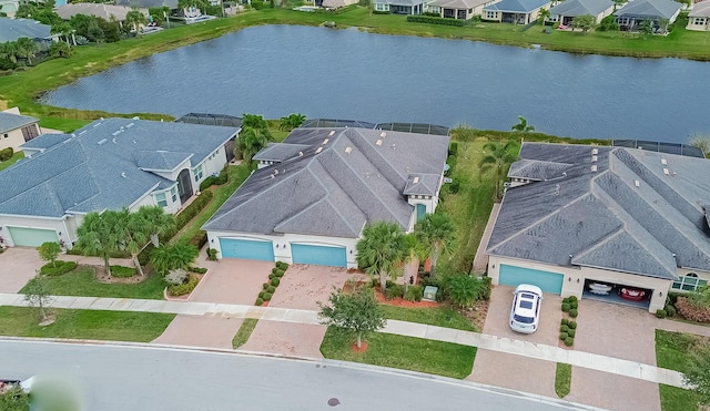 drone / aerial view with a water view