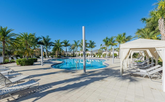 view of pool featuring a patio and a gazebo